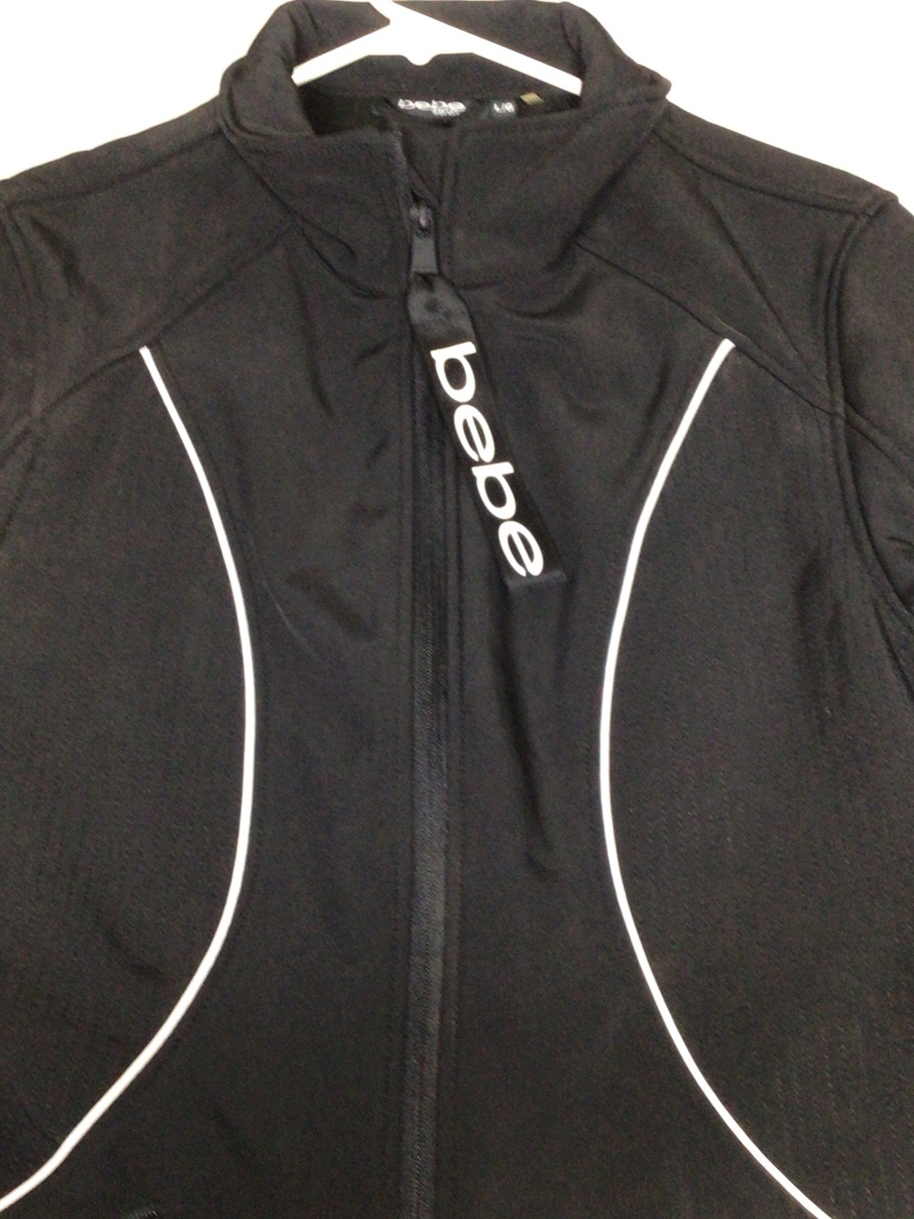 bebe Black Performance Zip Jacket with White Piping c ladies all sea jacket